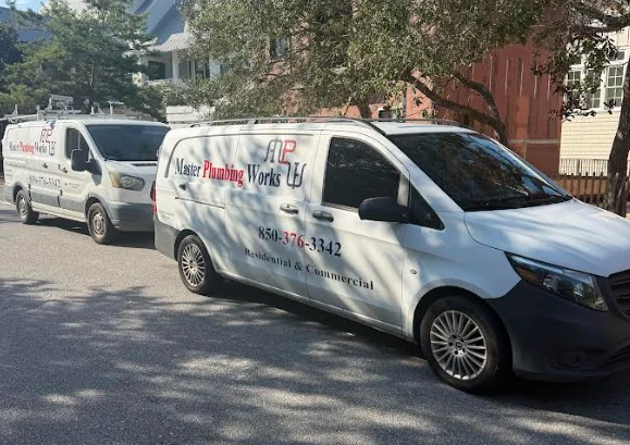 Master Plumbing Works fleet of branded plumbing vans